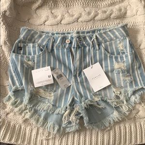 Buckle Jean shorts (medium) runs small
